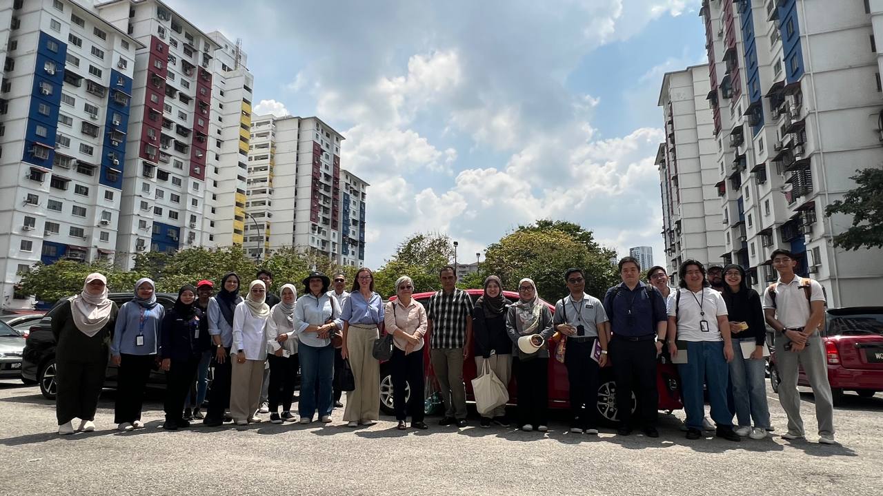 Group visit to a housing area